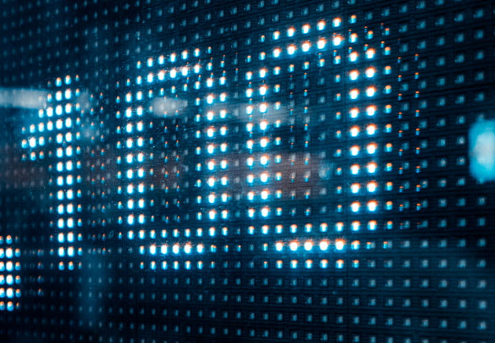 Wall street sidewalk with screen ticker