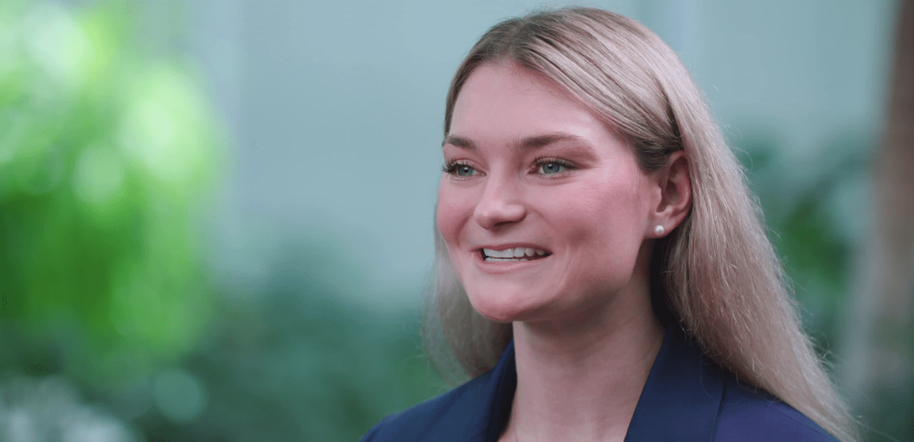Headshot of Jordan Di Verniero wearing a navy blazer