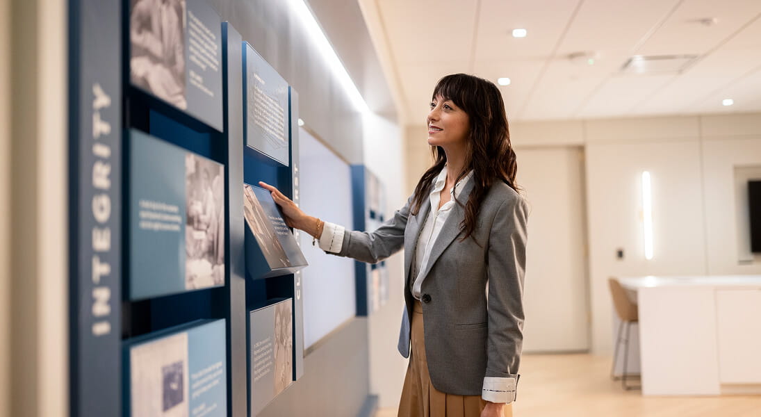 Female associate at the Raymond James experience center